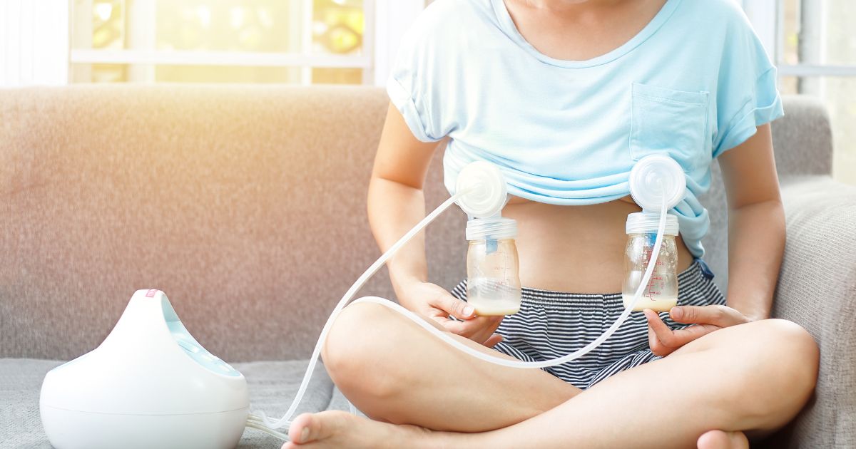 mother using breast pump