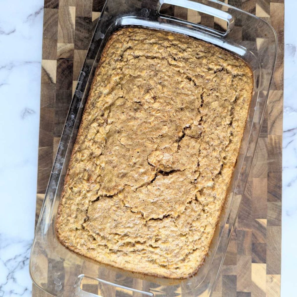 finished baked oatmeal in glass baking dish